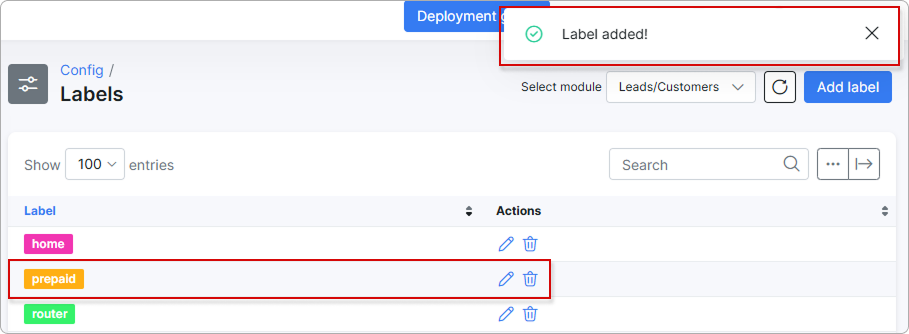 A notification at the top right confirming that the label was added, and a new label row now visible in the table